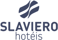 The Slaviero Hotéis logo features a stylized abstract symbol above the company name, with SLAVIERO in bold uppercase letters and hotéis in lowercase below, all in dark blue, reflecting innovation similar to leading revenue management software.